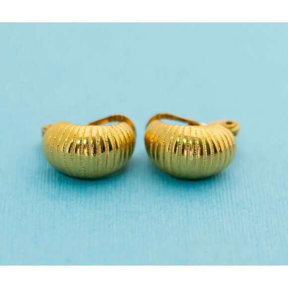 Vintage Golden Hard Shell Clip On Earrings by Monet - N11 - Picture 1 of 3